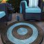 Kruhový koberec tyrkysové barvy