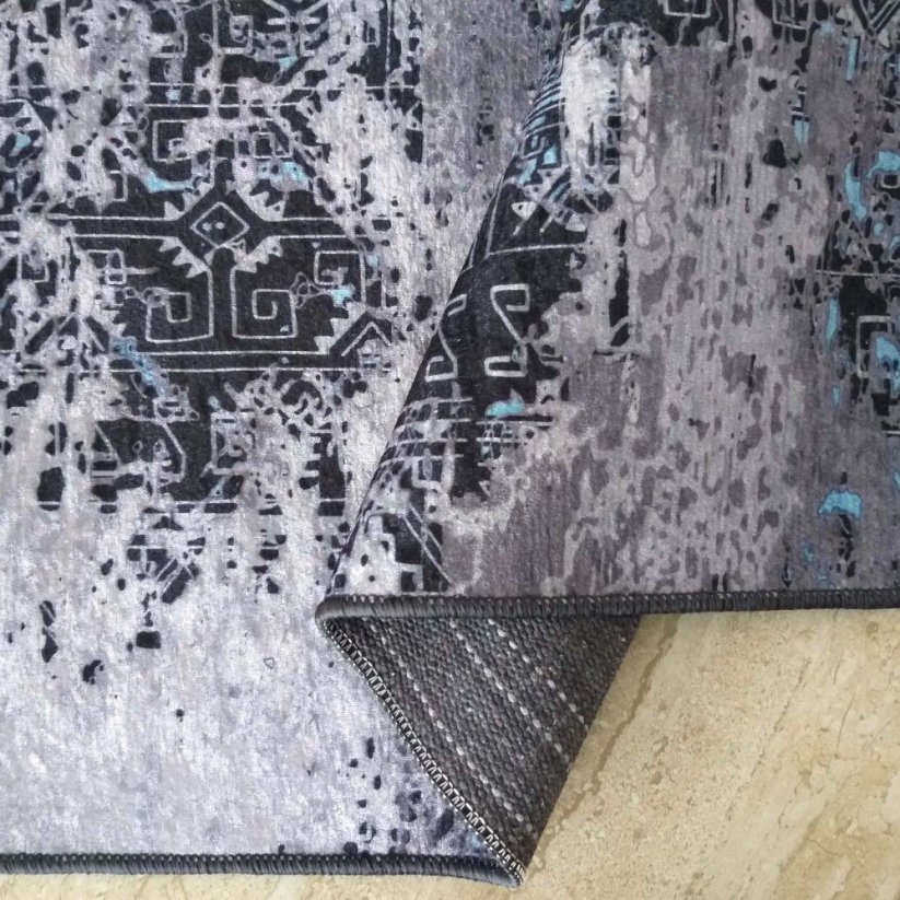 Mehrfarbiger Teppich mit silbernem und blauem Motiv