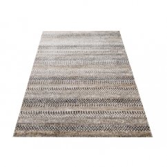 Moderný koberec s hrubo tkaným vzorom béžovej farby