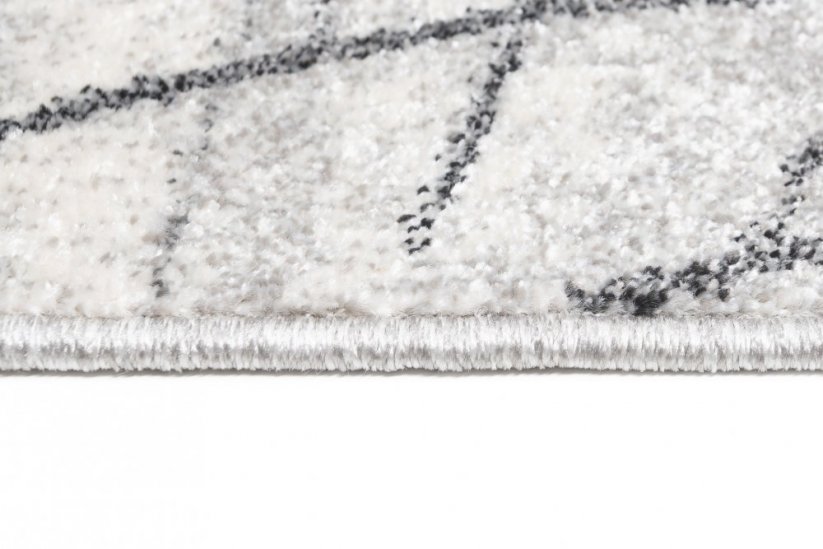 Světle krémový moderní koberec s motivem listů - Rozměr koberce: Šířka: 140 cm | Délka: 200 cm