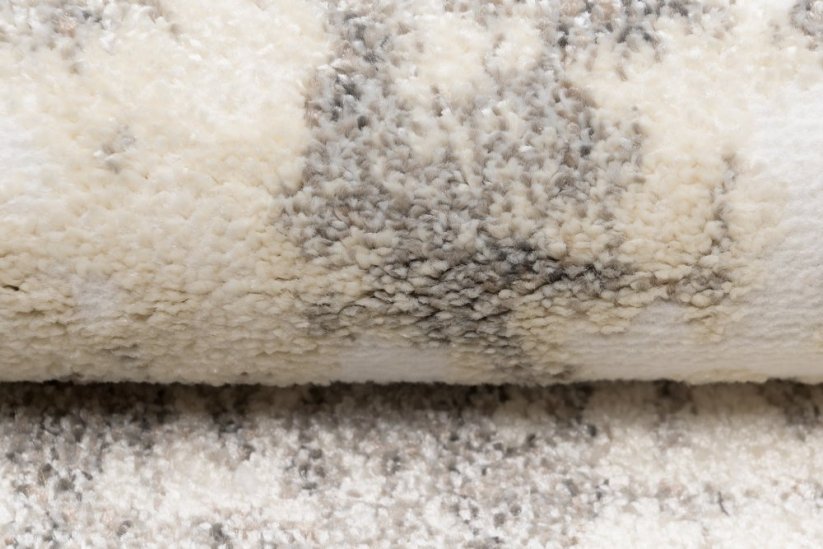 ARIA Dizájnos krémszínű szőnyeg absztrakt mintával