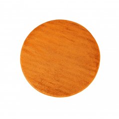 Runder orangefarbener Teppich