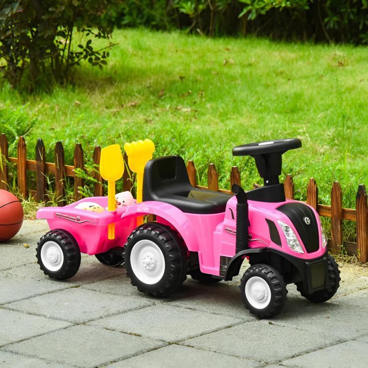Kék traktor NEW HOLLAND mellékvágányokkal és szerszámokkal