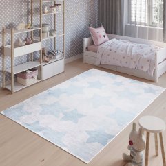 Kinderteppich mit blauem Sternenmotiv
