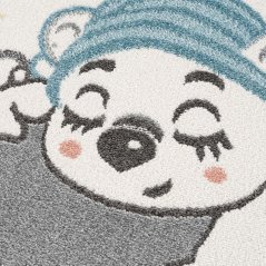 Béžový kulatý koberec s motivem medvídka