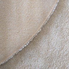 Moderno tappeto rotondo di colore beige