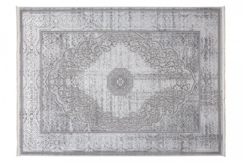 Exkluzívny koberec sivej farby s bielym orientálnym vzorom