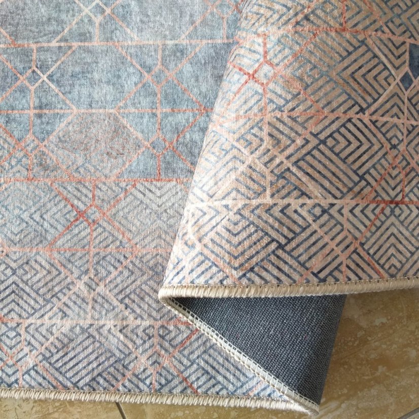 Protišmykový koberec s geometrickým vzorom