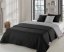 Obojstranné prehozy na posteľ čiernej farby so vzorom