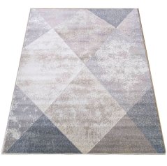 Béžový koberec s moderním geometrickým vzorem