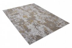 Moderner grauer Teppich mit Goldmotiv