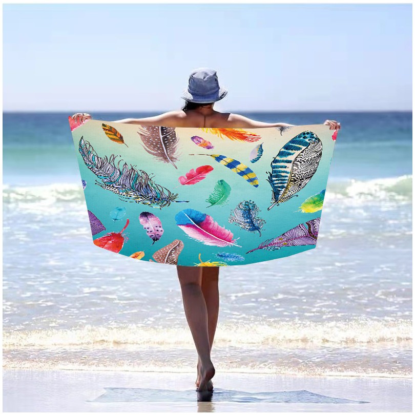 Plážová osuška s motívom farebných pierok 100 x 180 cm