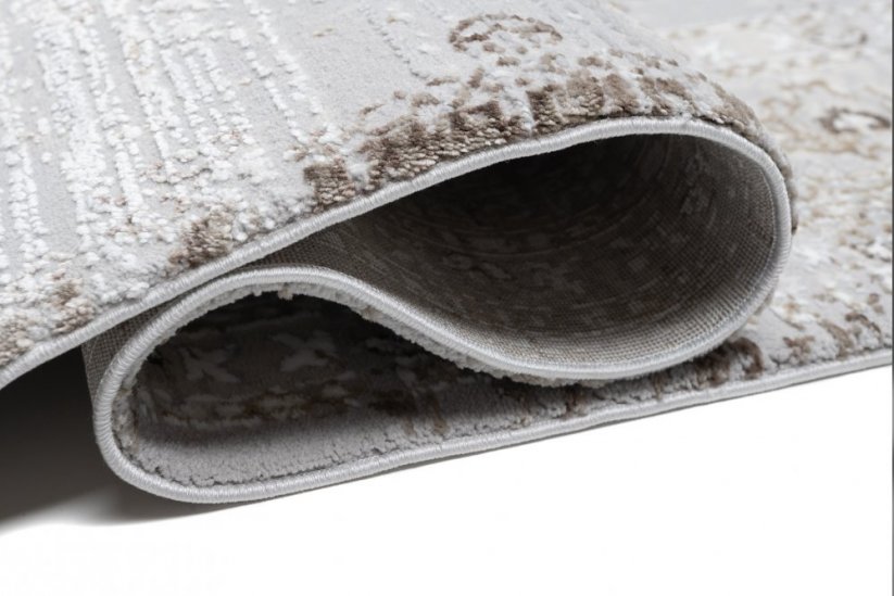 Světlý bílo-šedý vintage designový koberec se vzory