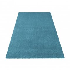 Einfarbiger blauer Teppich