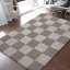 Brauner doppelseitiger Teppich mit Quadraten
