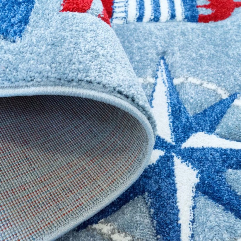 Kulatý koberec s námořnickým motivem modré barvy