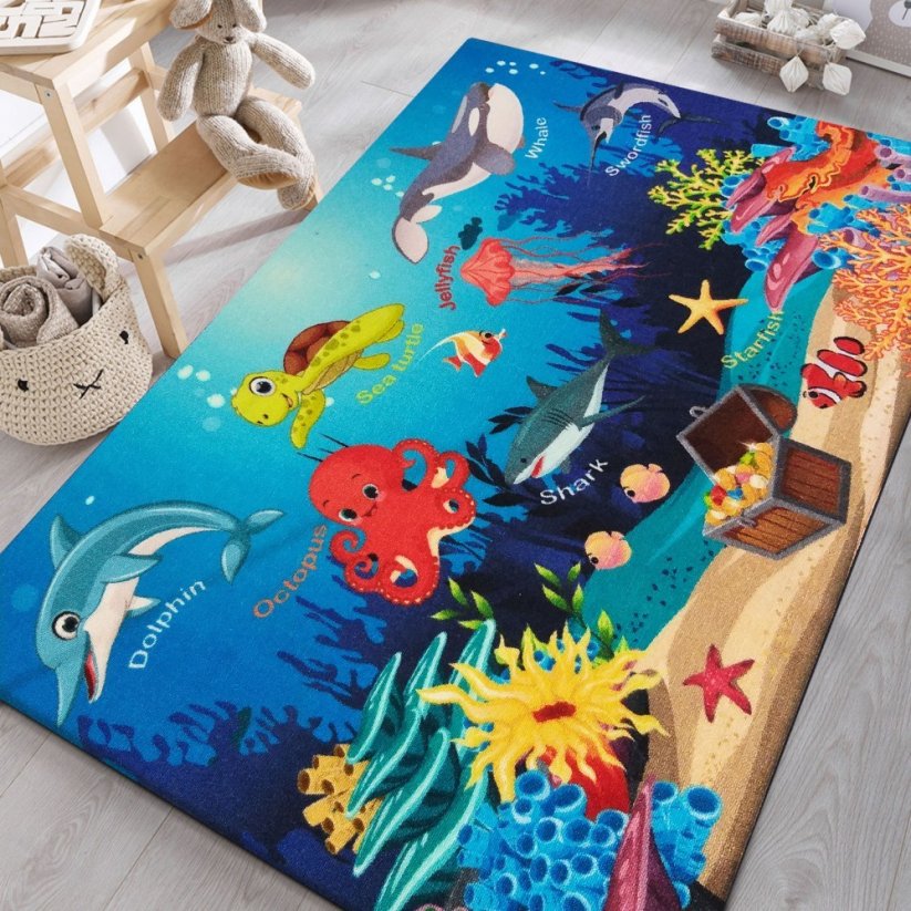 Fenomenale tappeto blu per bambini con un motivo di mondo sottomarino