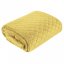 Žlutý oboustranný přehoz na postel s dekorativním prošíváním