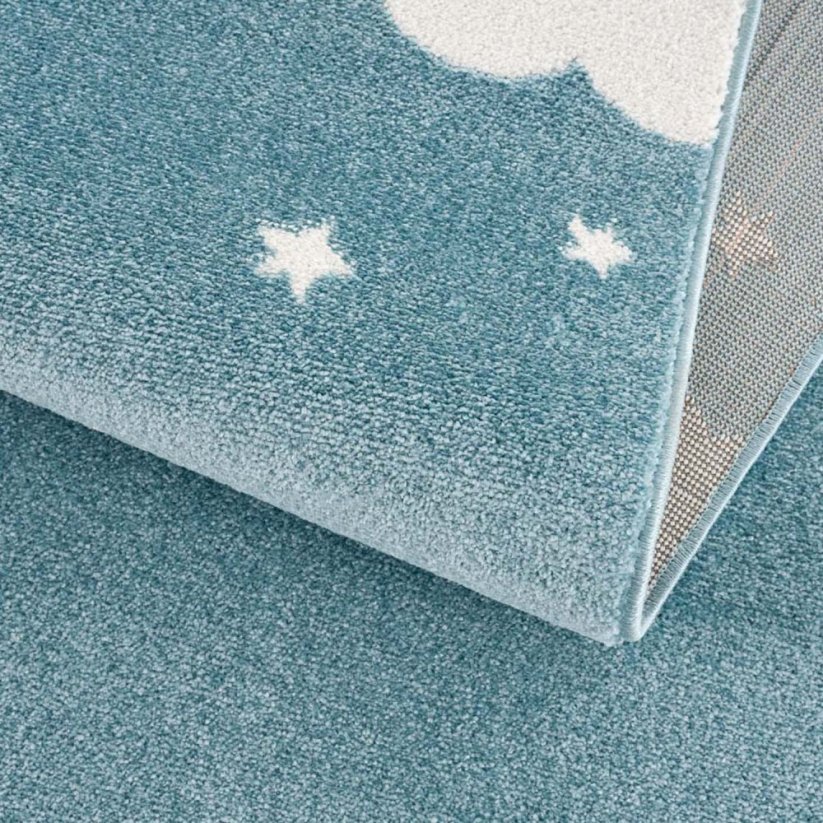 Modrý okrúhly koberec s roztomilým motívom