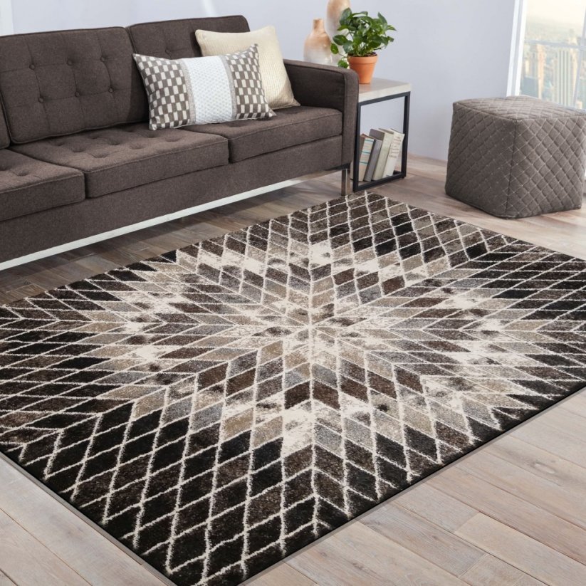 Kvalitní koberec s abstraktním vzorem květu hnědé barvy
