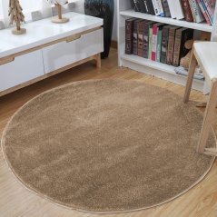 Кръгъл килим с бежов цвят