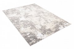 Tepih krem dizajna sa sivim apstraktnim uzorkom