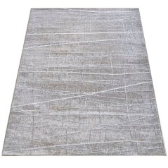 Béžový koberec s minimalistickými vzormi
