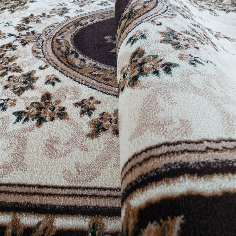 Ekskluzivni ovalni tepih u smeđoj boji