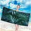 Telo mare con motivo foglie tropicali 100 x 180 cm
