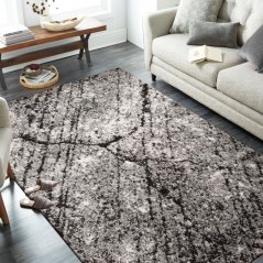 Moderni smeđi tepih s motivom koji podsjeća na mramor