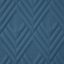 Eine moderne blaue Tagesdecke mit einem Muster