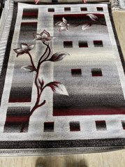 Moderný koberec do obývačky s motívom kvetov
