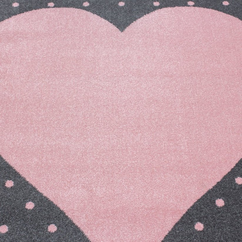 Tappeto lussuoso grigio e rosa per la cameretta dei bambini con cuore grande
