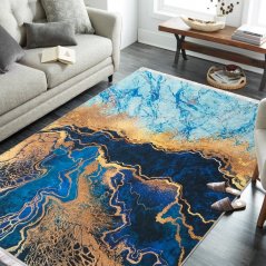 Protišmykový koberec v modrej farbe s abstraktným vzorom