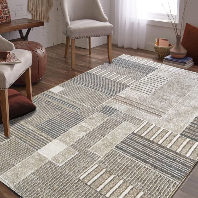 Bézs színű szőnyeg geometrikus mintákkal 