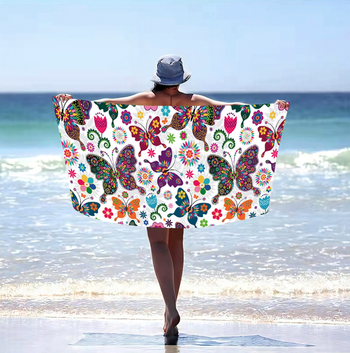 Plážová osuška s barevnými motýly
