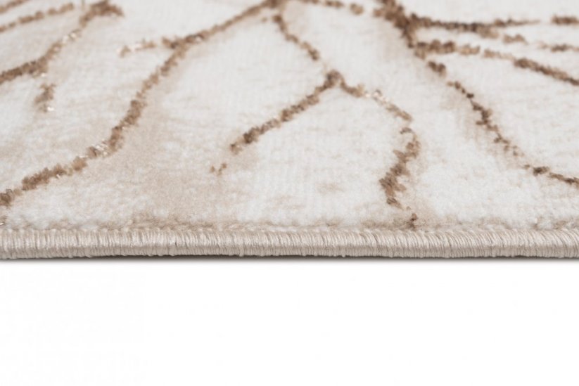 Jednostavan moderan tepih bež boje sa smeđim motivom
