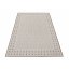 Béžový koberec s jednoduchým geometrickým vzorem