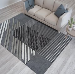 Дизайнерски килим в сиво с ивици