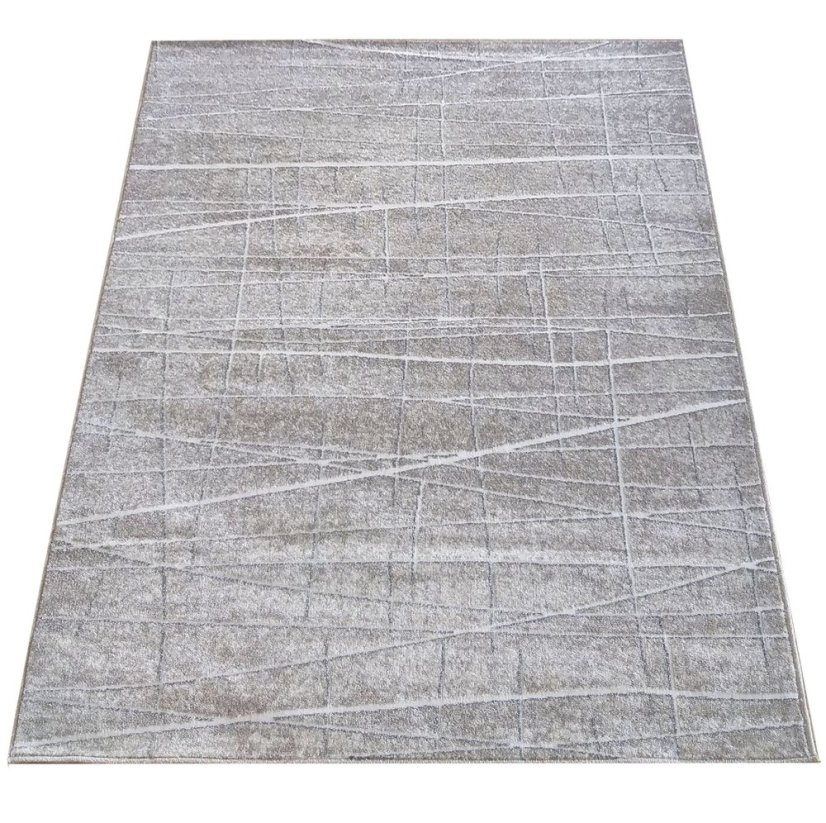 Beigefarbener Teppich mit minimalistischen Mustern 