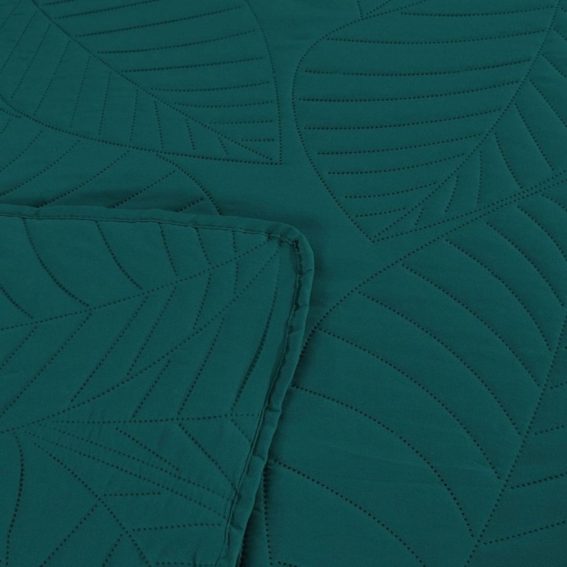 Zöld ágytakaró levél motívummal