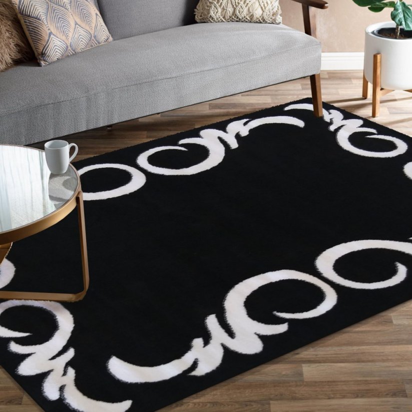 Черен килим с бял орнамент