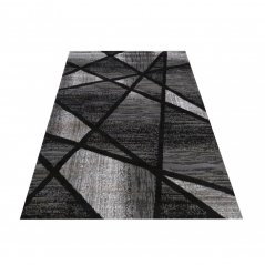 Модерен сиво-черен килим с абстрактен модел
