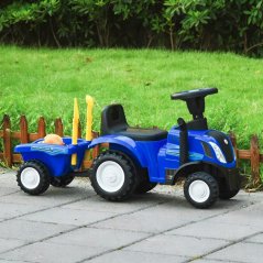 Modrý traktor NEW HOLLAND s vlečkou a nářadím