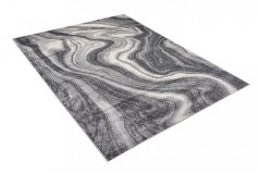 Tappeto di design grigio scuro con motivo astratto