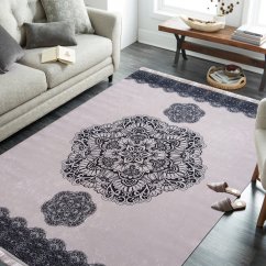 Pudrově růžový koberec s motivem mandala