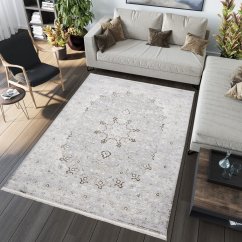 Svetlý bielo-sivý dizajnový vintage koberec so vzormi