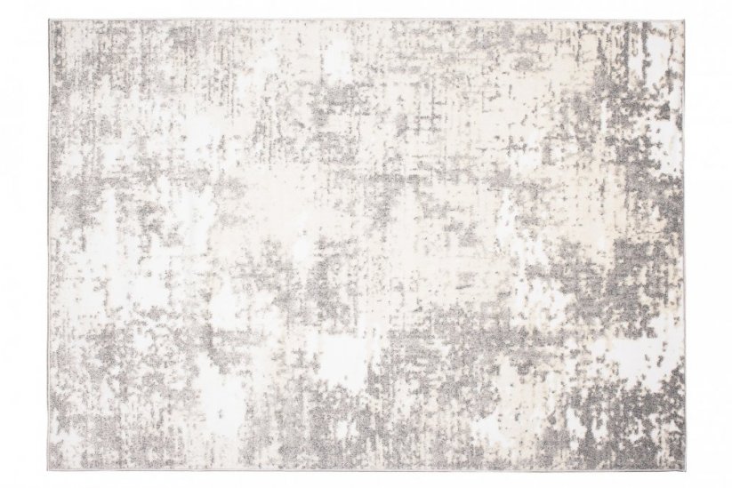 Kremasta preproga s sivim abstraktnim vzorcem