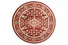 Kulatý vintage koberec v červené barvě