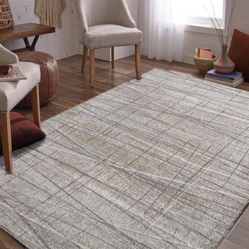 Beigefarbener Teppich mit minimalistischen Mustern 